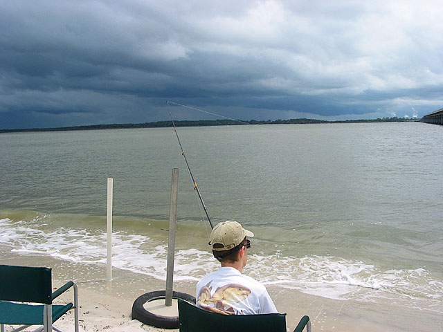 Fishing under ominous skies in Amelia Island, Florida